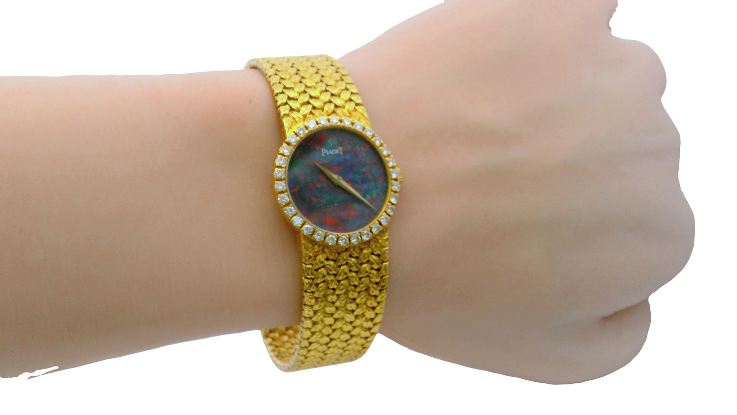 Piaget 15706 D2 Ladies Watch – 18K Yellow Gold, Diamond Bezel, Opal Dial, Quartz