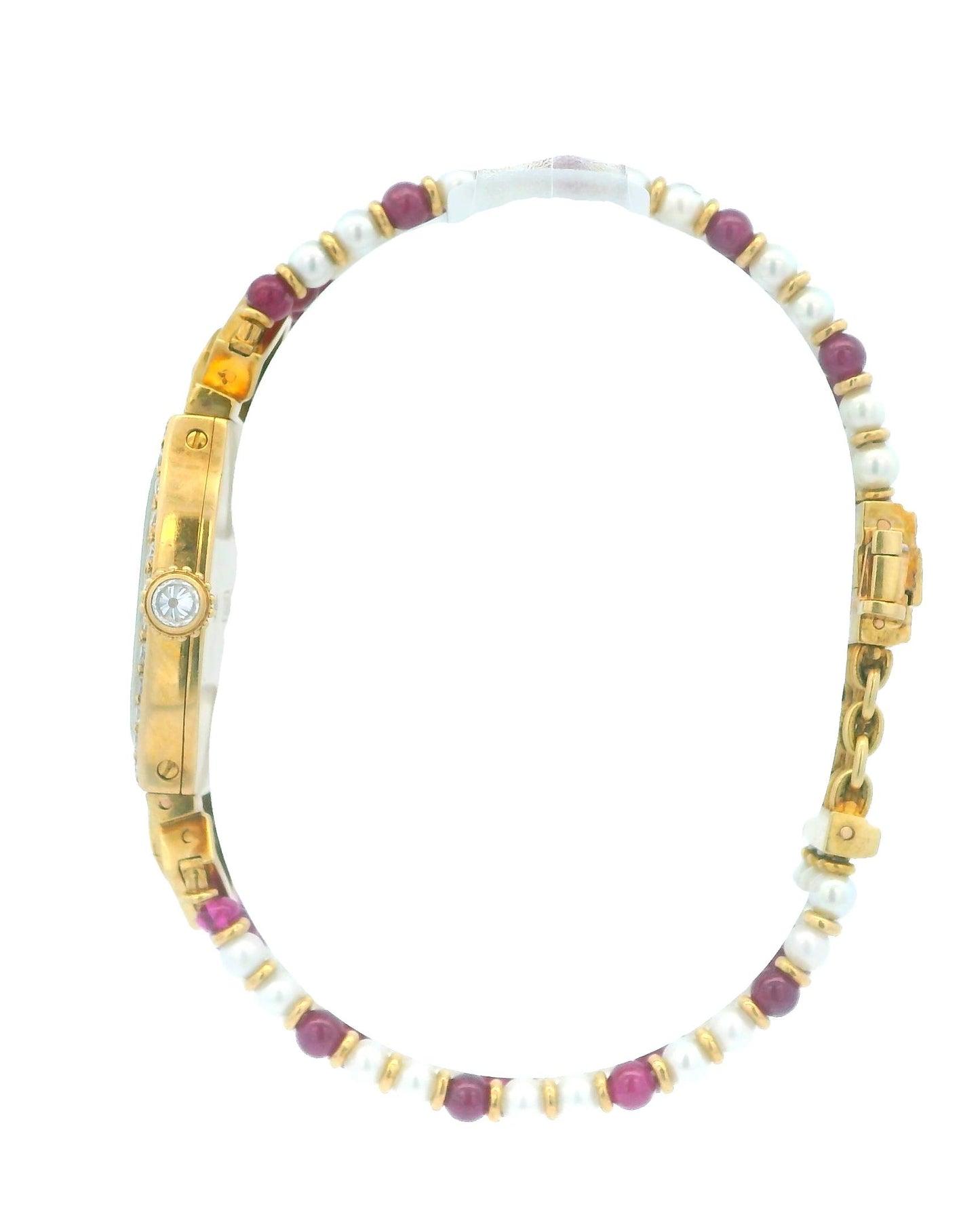 Cartier Tonneau A Rare Lady's Yellow Gold, Ruby, Diamond and Pearl-Set Bracelet