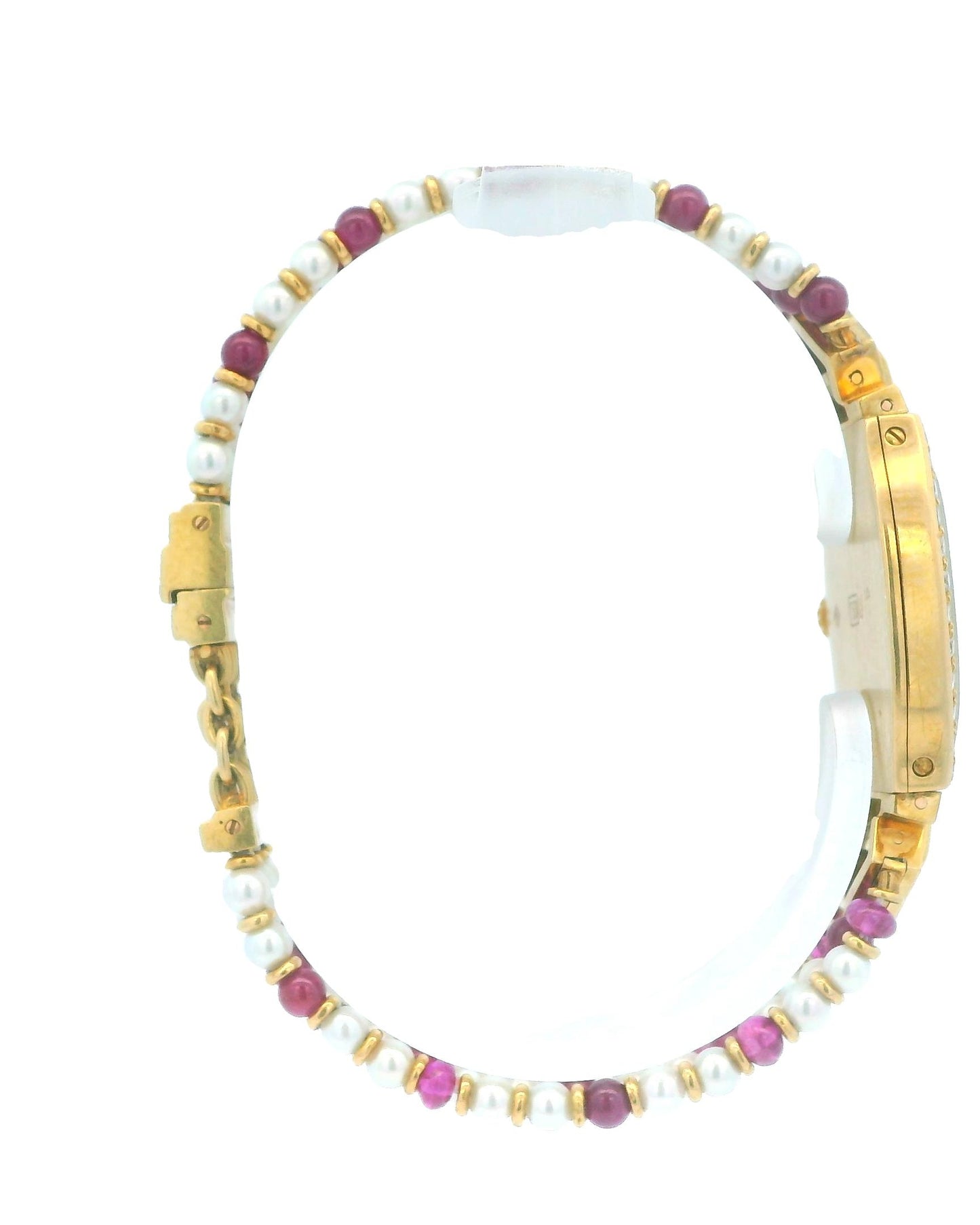 Cartier Tonneau A Rare Lady's Yellow Gold, Ruby, Diamond and Pearl-Set Bracelet