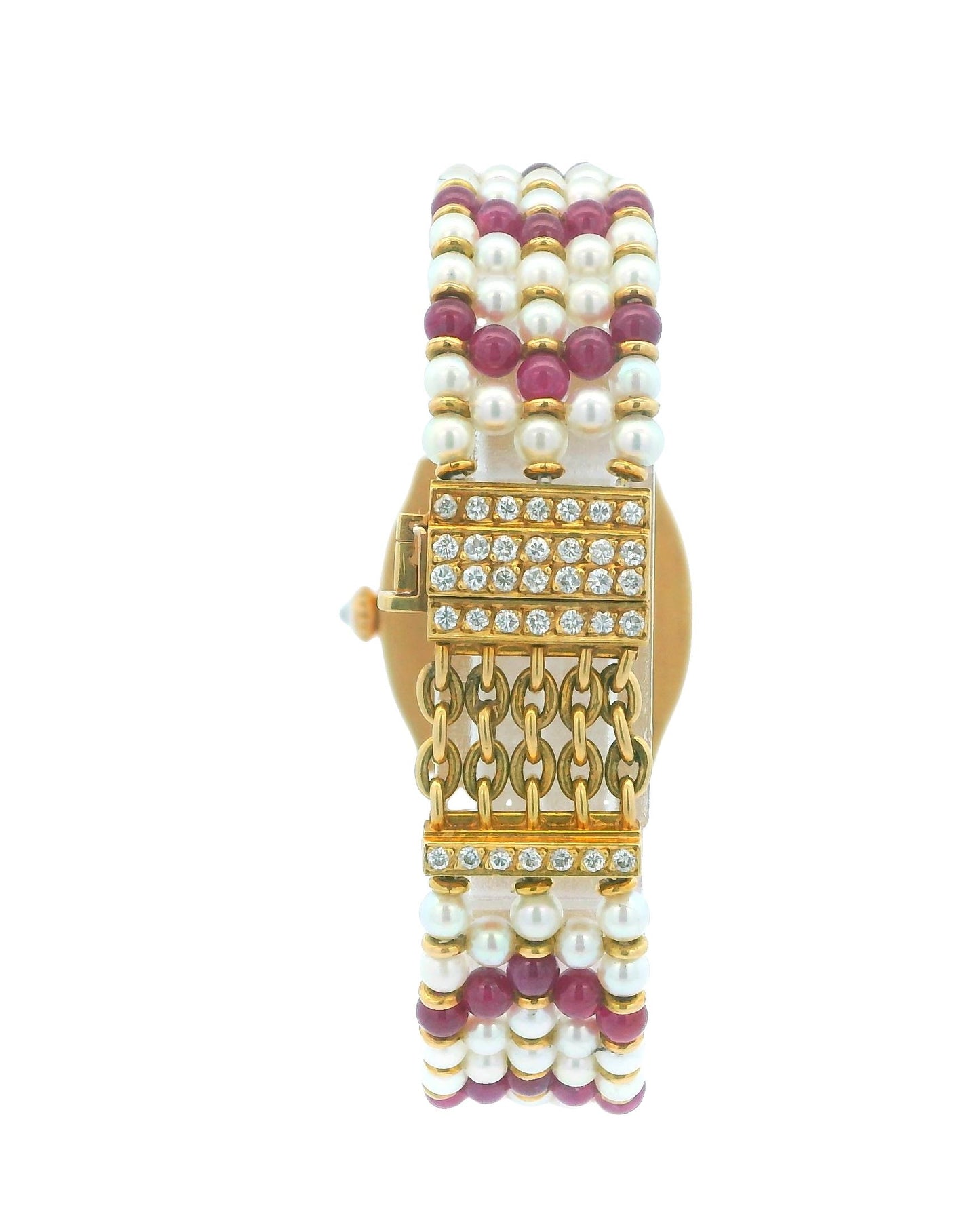 Cartier Tonneau A Rare Lady's Yellow Gold, Ruby, Diamond and Pearl-Set Bracelet