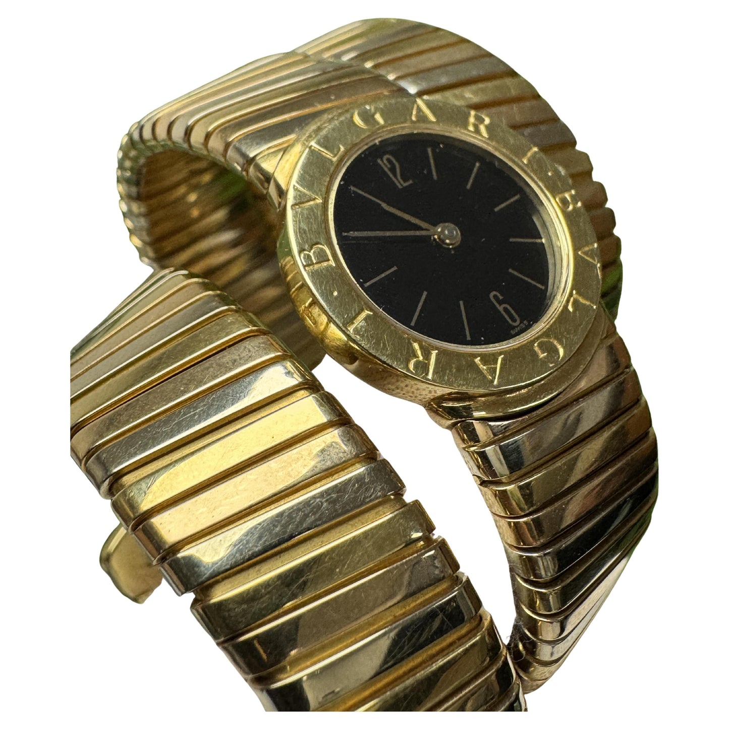 Bvlgari Vintage Tubogas Tricolor, in center watch, Double Wrap Tapered