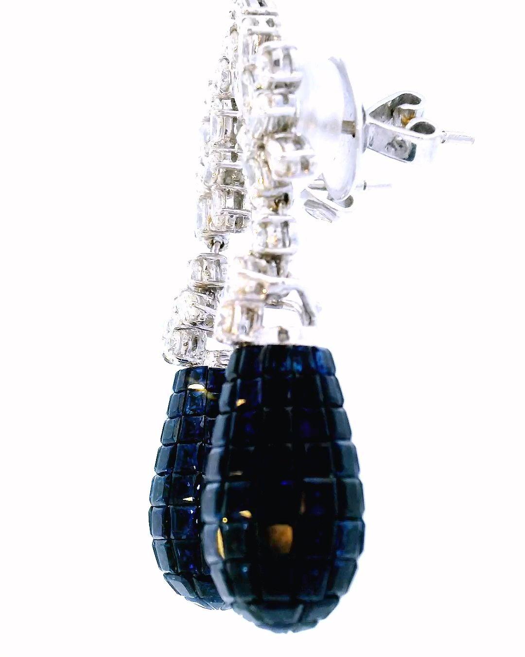 Earrings with invisibly set sapphire drops 12ct total weight and 3.16 tw diamond