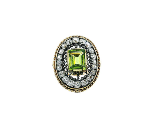 Oval Cushion Peridot Ring with Diamond in Silver Filigree.