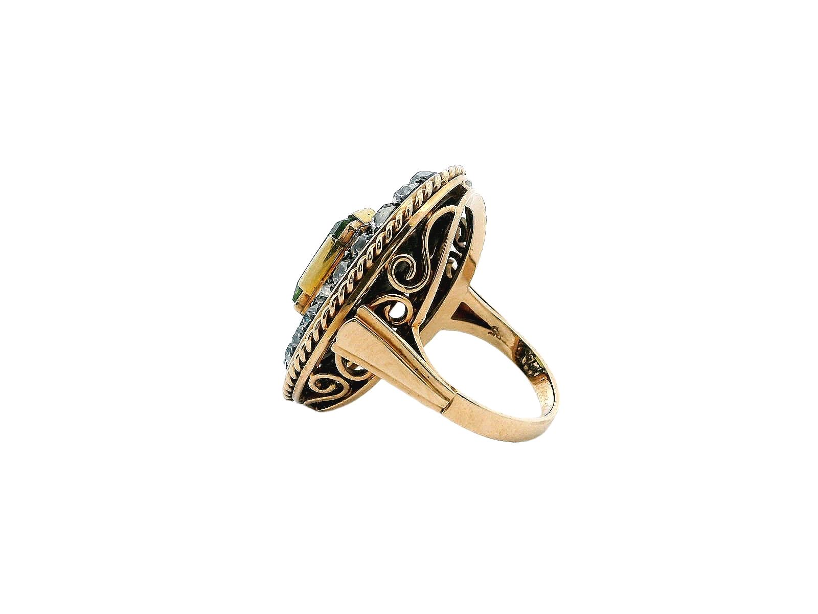 Oval Cushion Peridot Ring with Diamond in Silver Filigree.