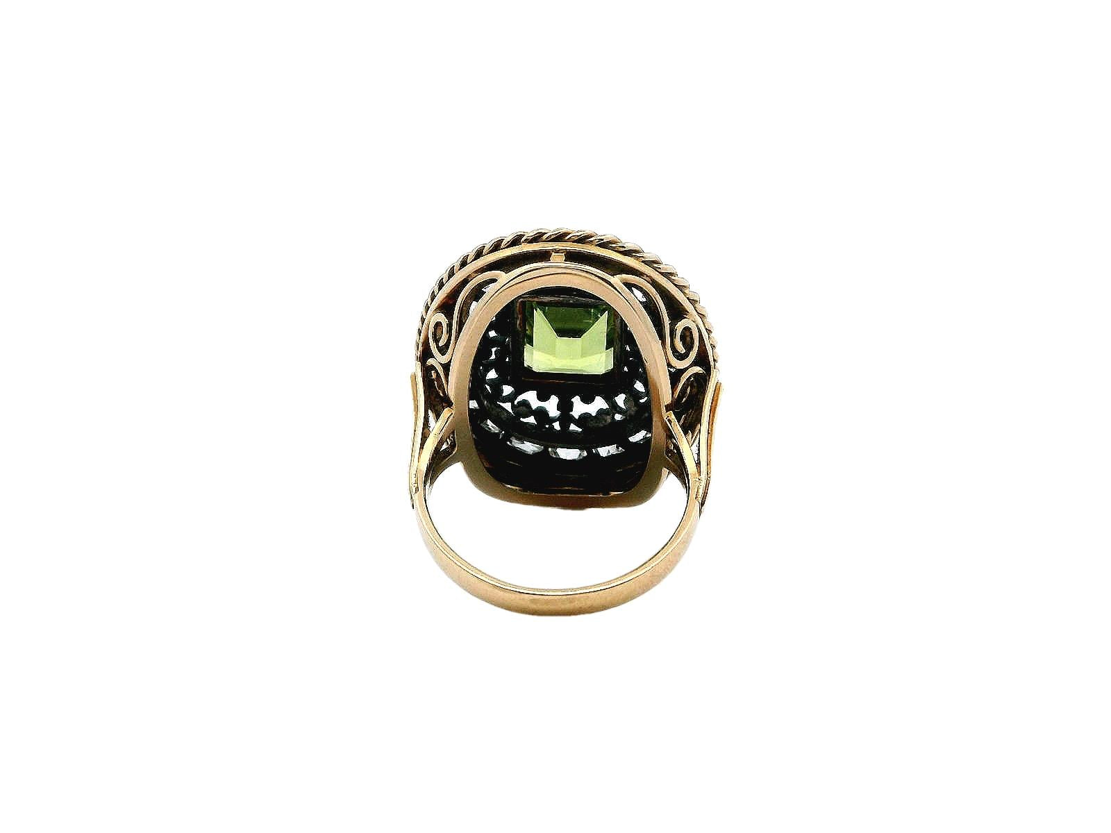 Oval Cushion Peridot Ring with Diamond in Silver Filigree.