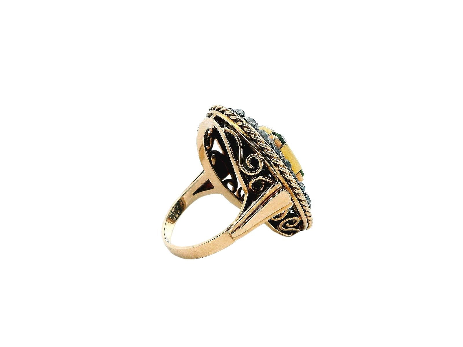 Oval Cushion Peridot Ring with Diamond in Silver Filigree.