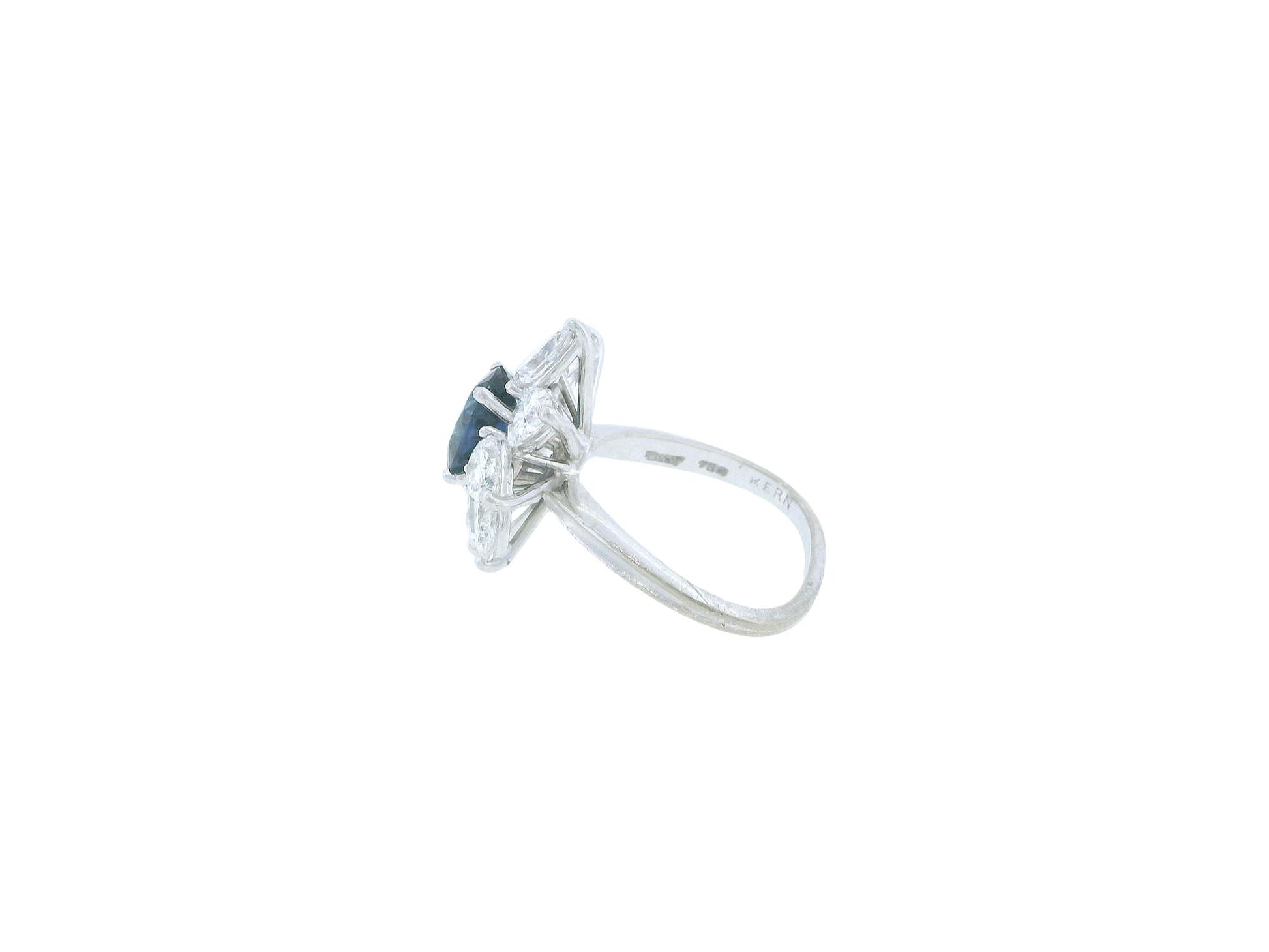 René Kern Platinum Center-Oval Sapphire Surrounded Pear Diamond Ring