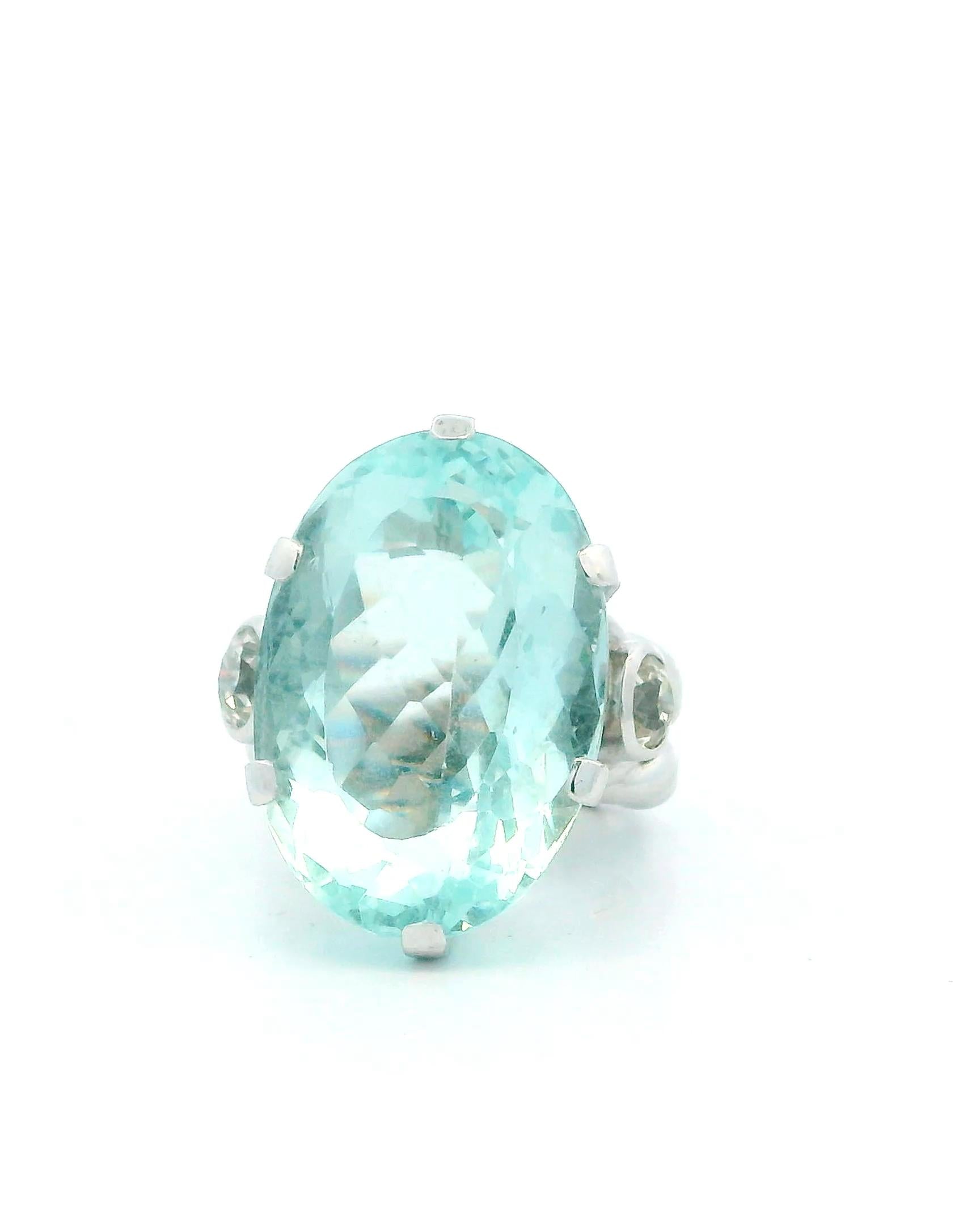 Ring 18kw lg oval 36ct aqua braided shank 2 side dias 1ct tw