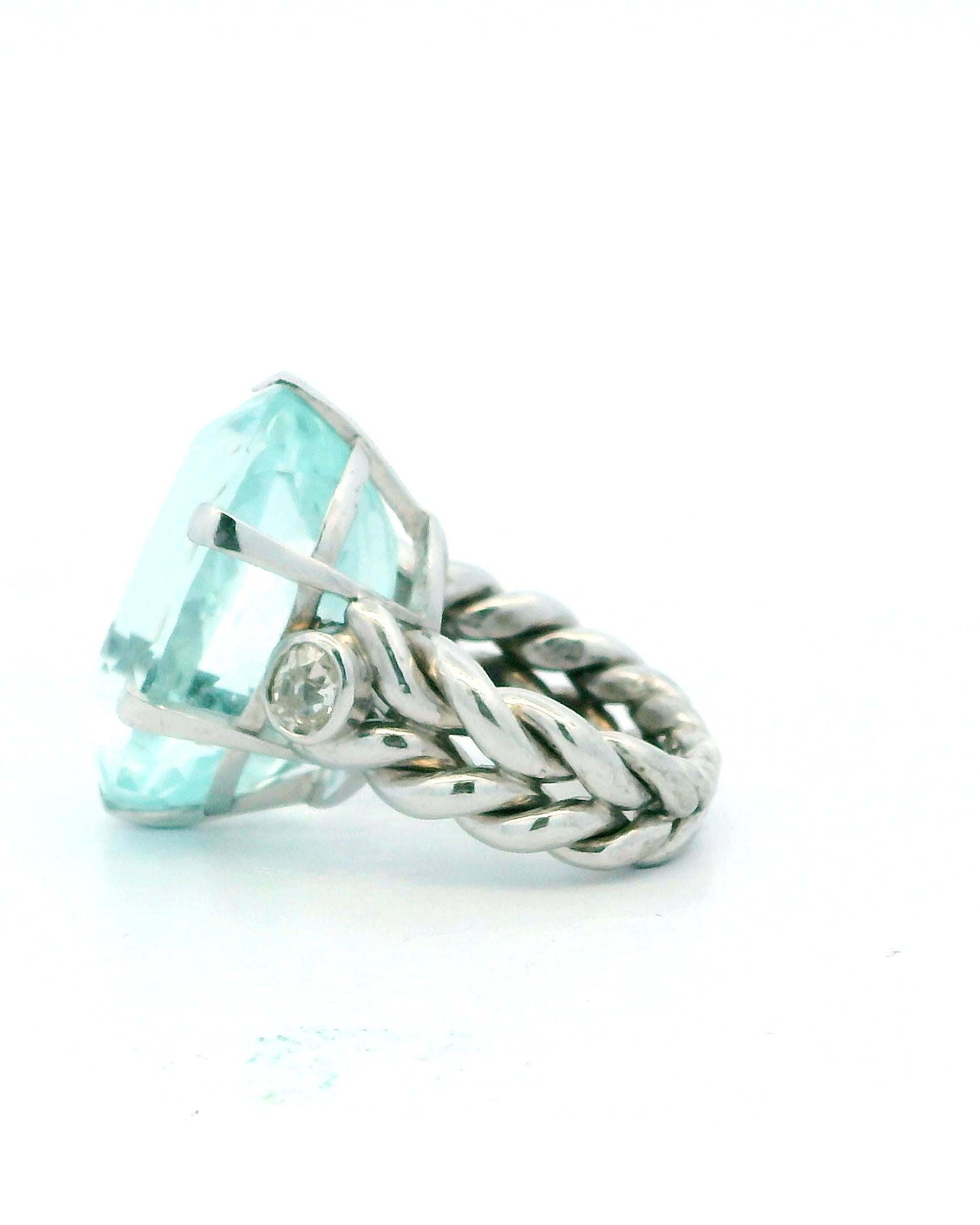 Ring 18kw lg oval 36ct aqua braided shank 2 side dias 1ct tw