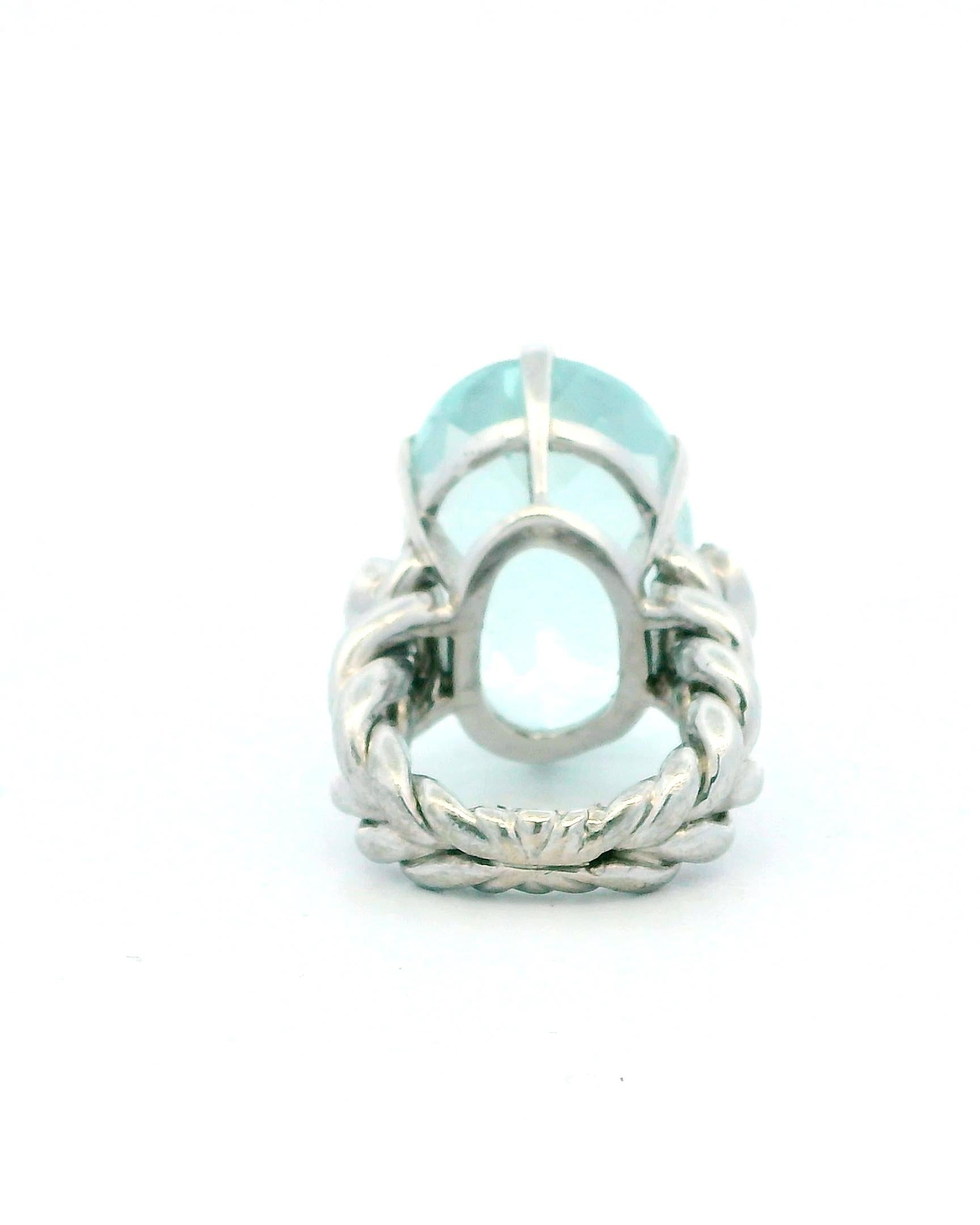 Ring 18kw lg oval 36ct aqua braided shank 2 side dias 1ct tw