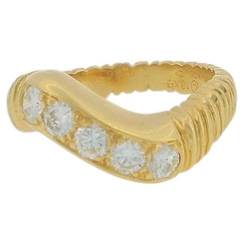 vca ring diag 5 diamond row text shank 0.67tw