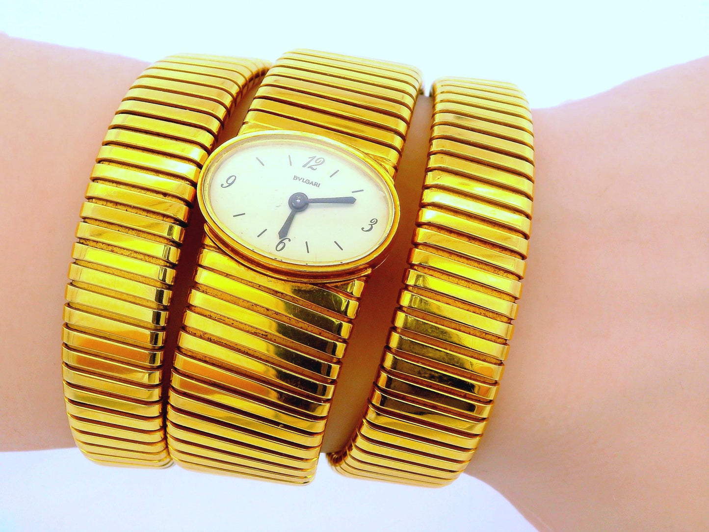 Bvlgari tubogas backwind central e/w oval watch tapered bracelet