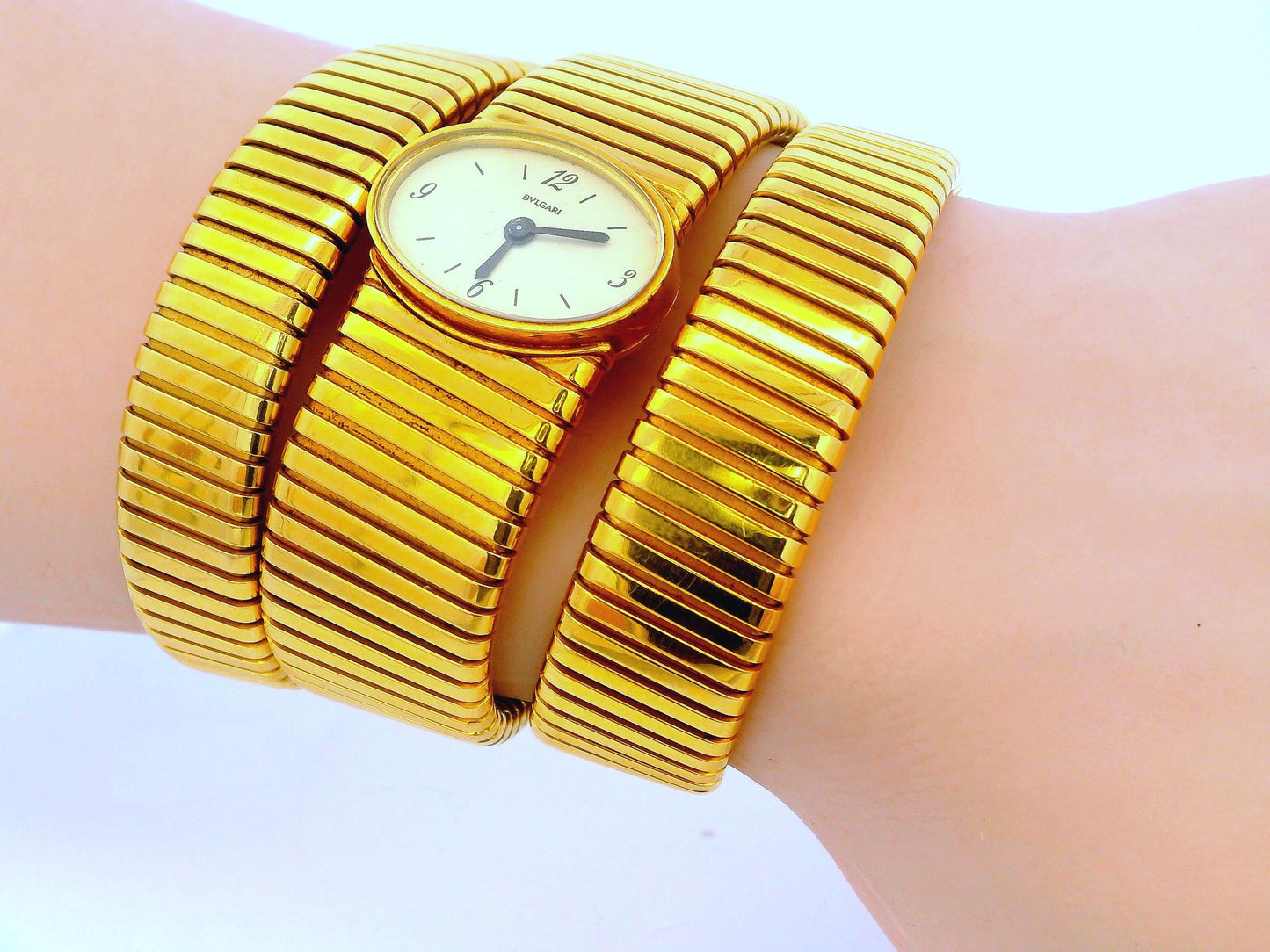 Bvlgari tubogas backwind central e/w oval watch tapered bracelet