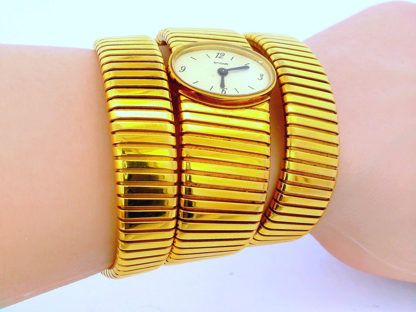 Bvlgari tubogas backwind central e/w oval watch tapered bracelet