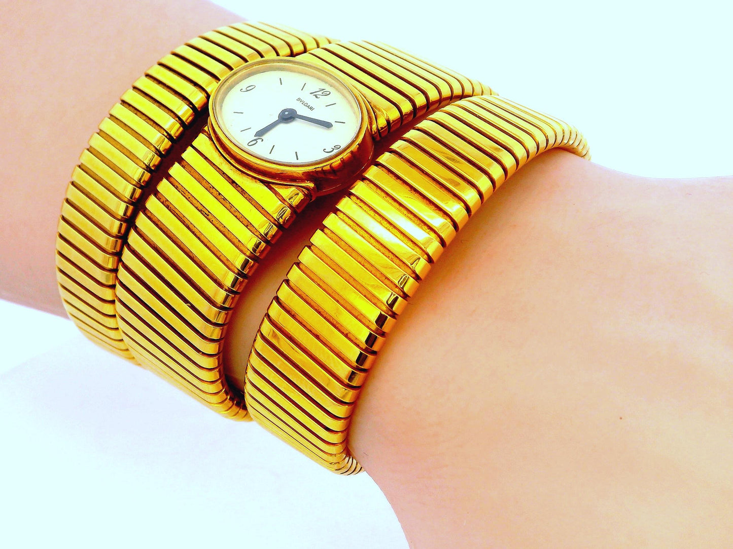 Bvlgari tubogas backwind central e/w oval watch tapered bracelet