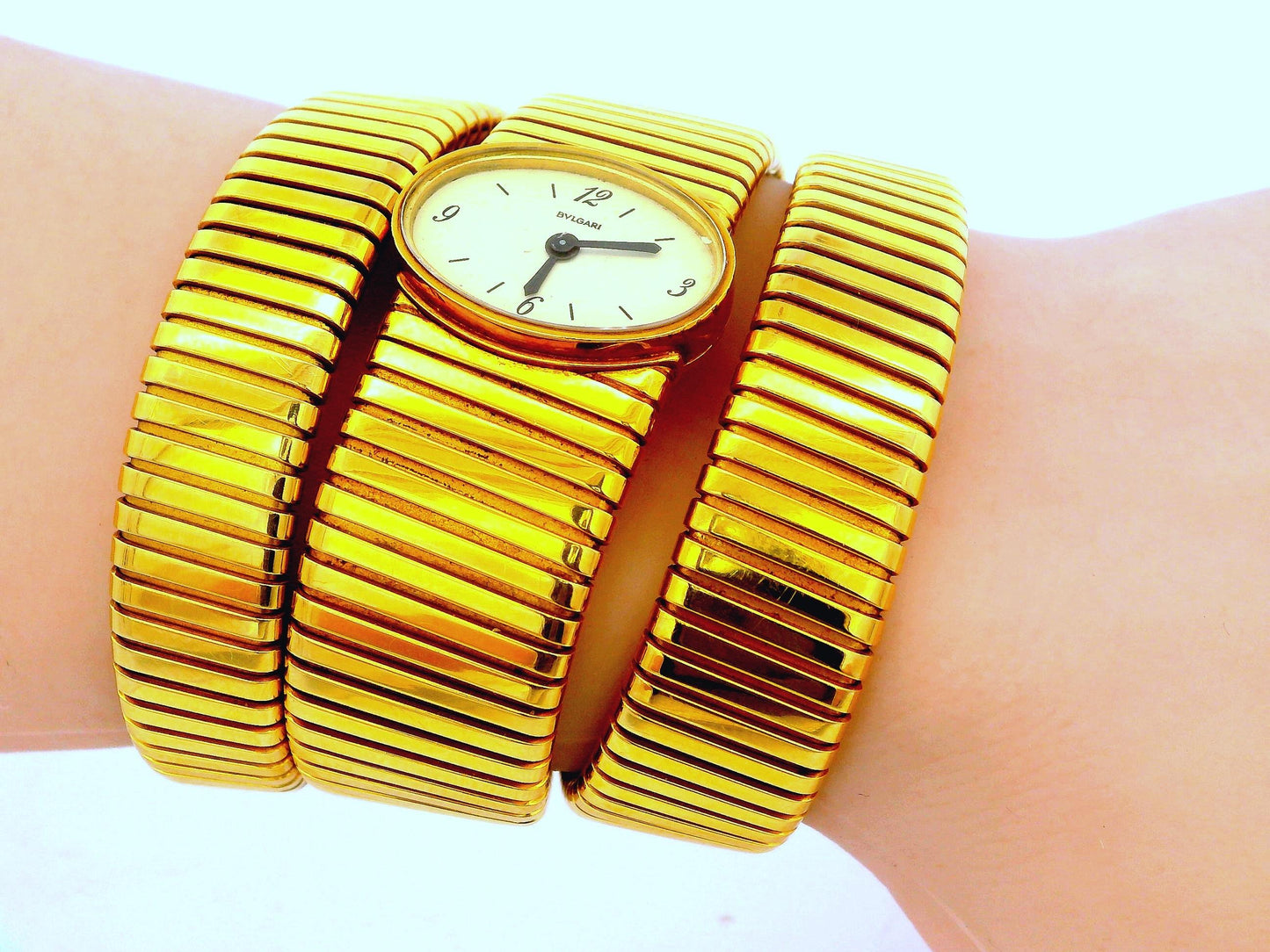 Bvlgari tubogas backwind central e/w oval watch tapered bracelet