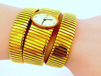 Bvlgari tubogas backwind central e/w oval watch tapered bracelet