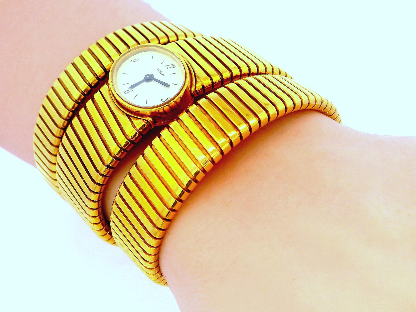 Bvlgari tubogas backwind central e/w oval watch tapered bracelet