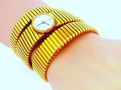 Bvlgari tubogas backwind central e/w oval watch tapered bracelet