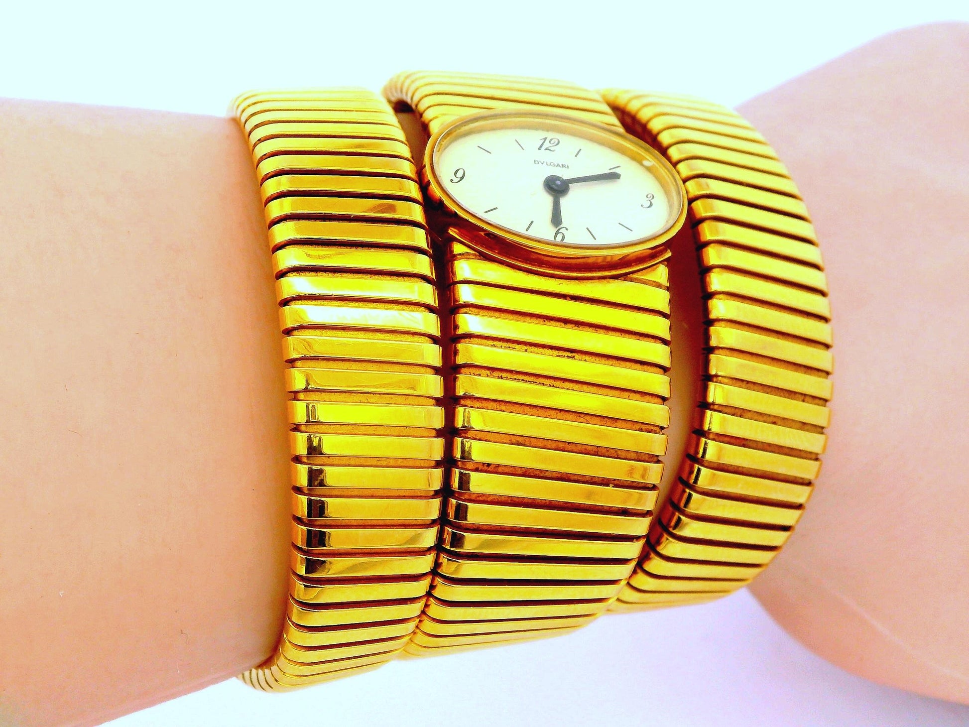 Bvlgari tubogas backwind central e/w oval watch tapered bracelet