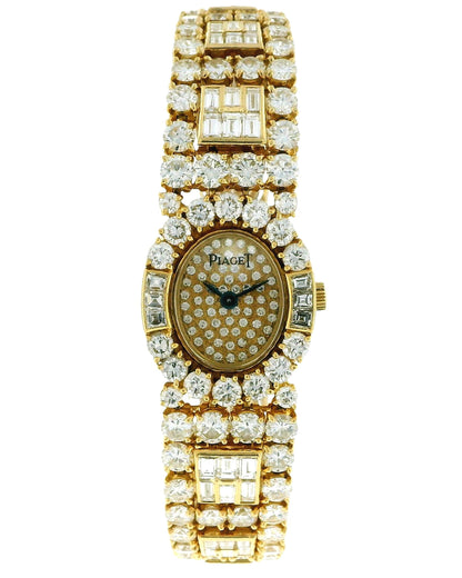 PIAGET. A LADY'S FINE 18K GOLD AND 28Cts DIAMOND-SET OVAL BRACELET WATCH