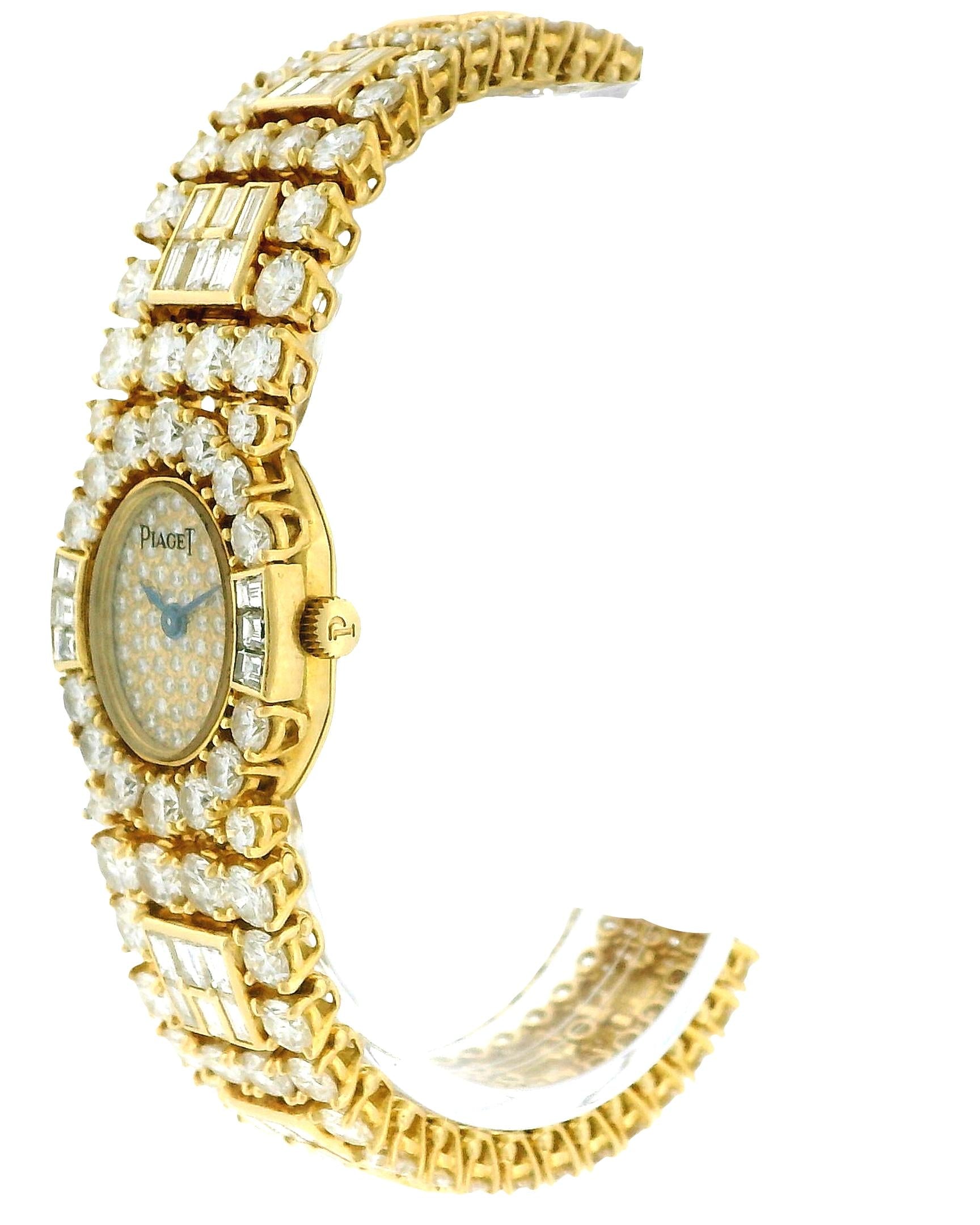 PIAGET. A LADY'S FINE 18K GOLD AND 28Cts DIAMOND-SET OVAL BRACELET WATCH
