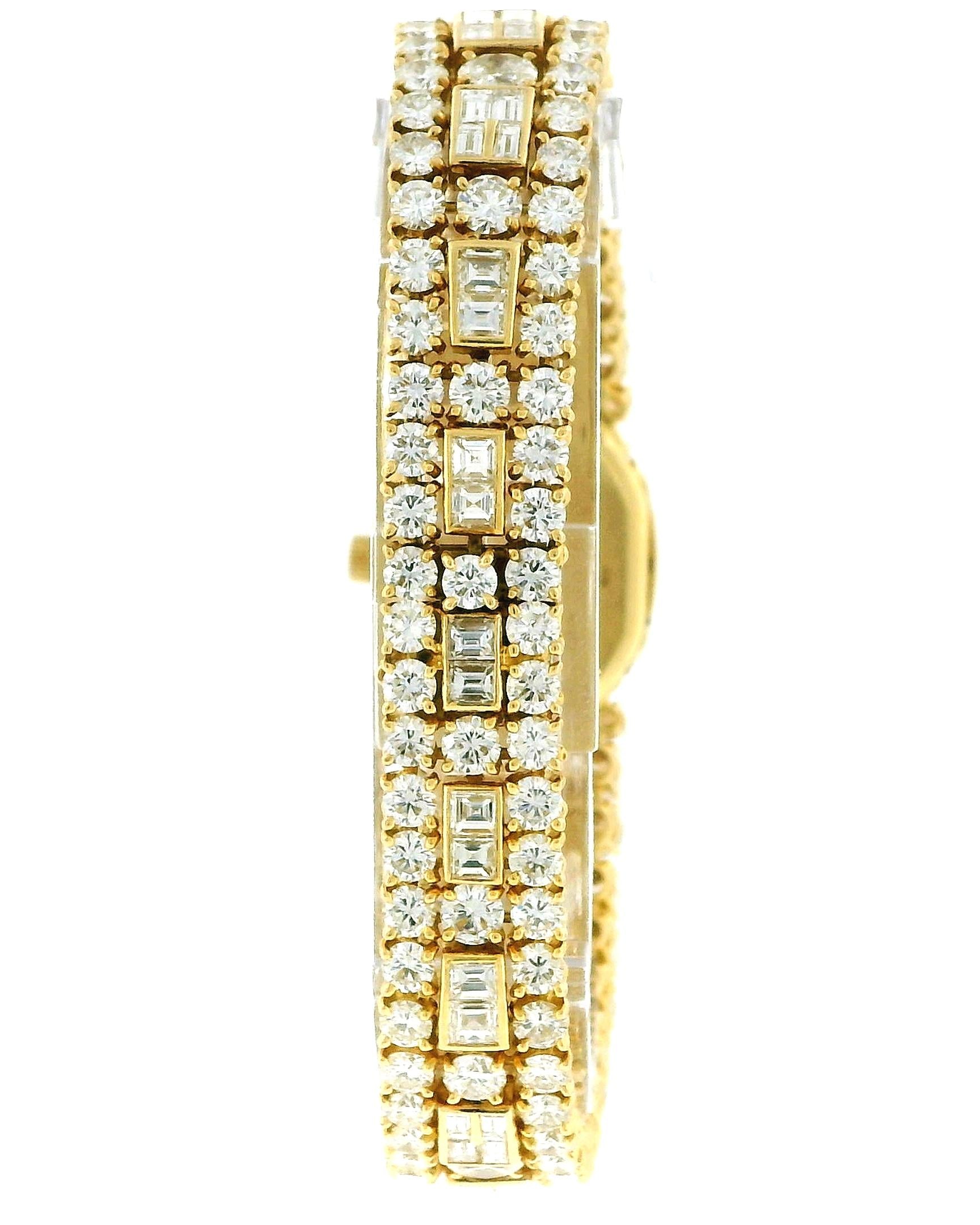 PIAGET. A LADY'S FINE 18K GOLD AND 28Cts DIAMOND-SET OVAL BRACELET WATCH