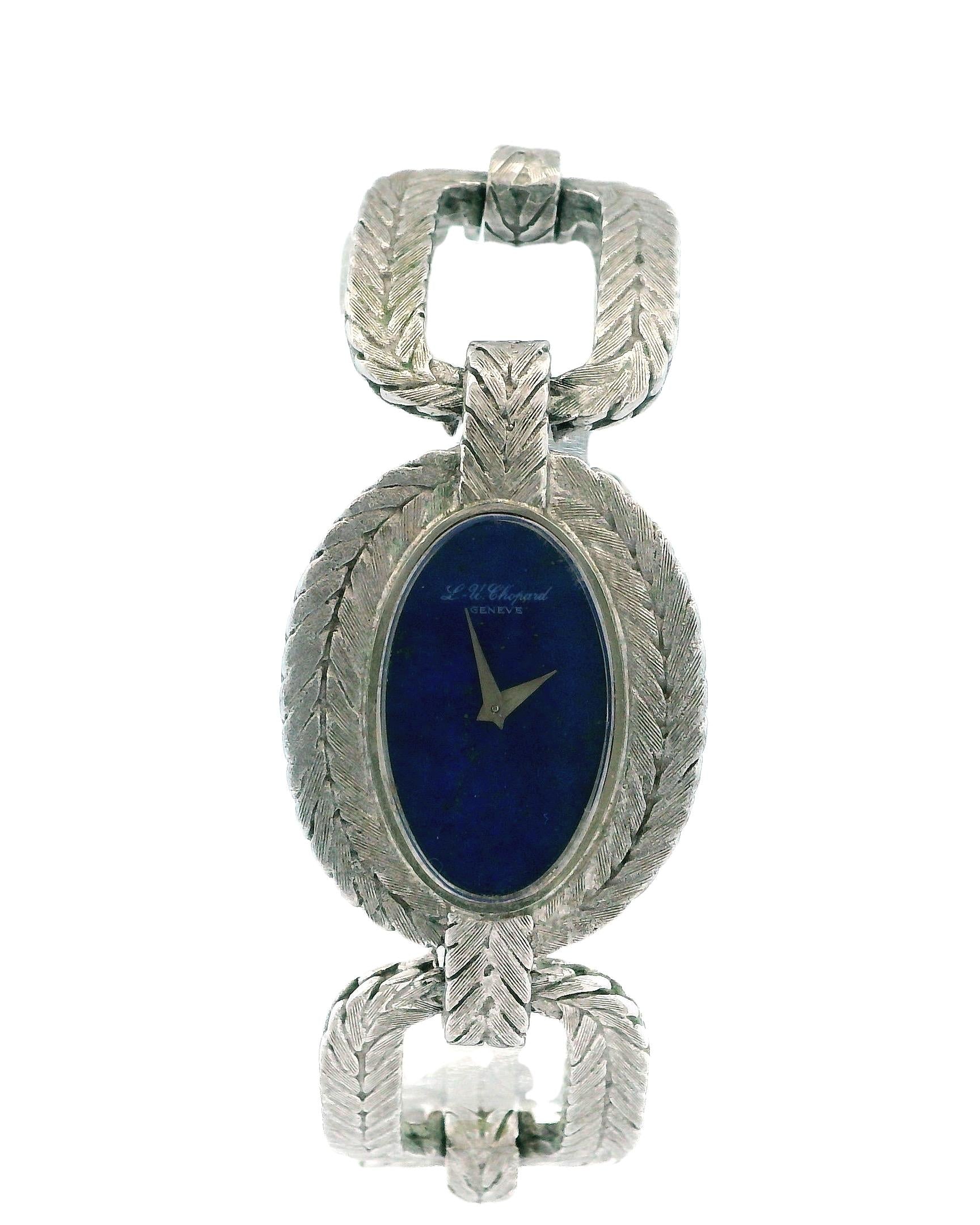 chopard oval lapis dial cush shp herringbone link brac 18kw