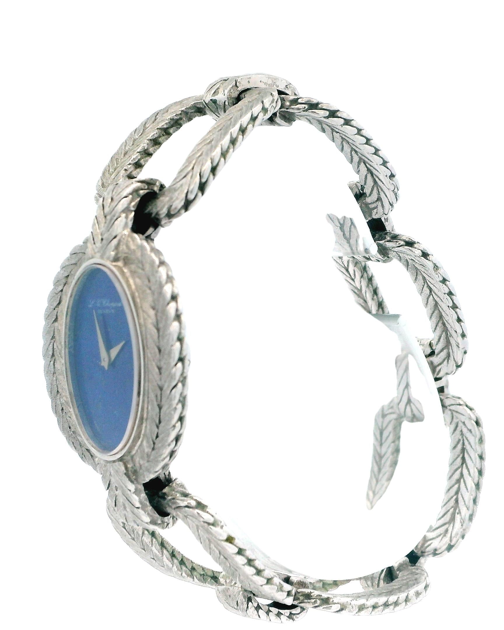chopard oval lapis dial cush shp herringbone link brac 18kw