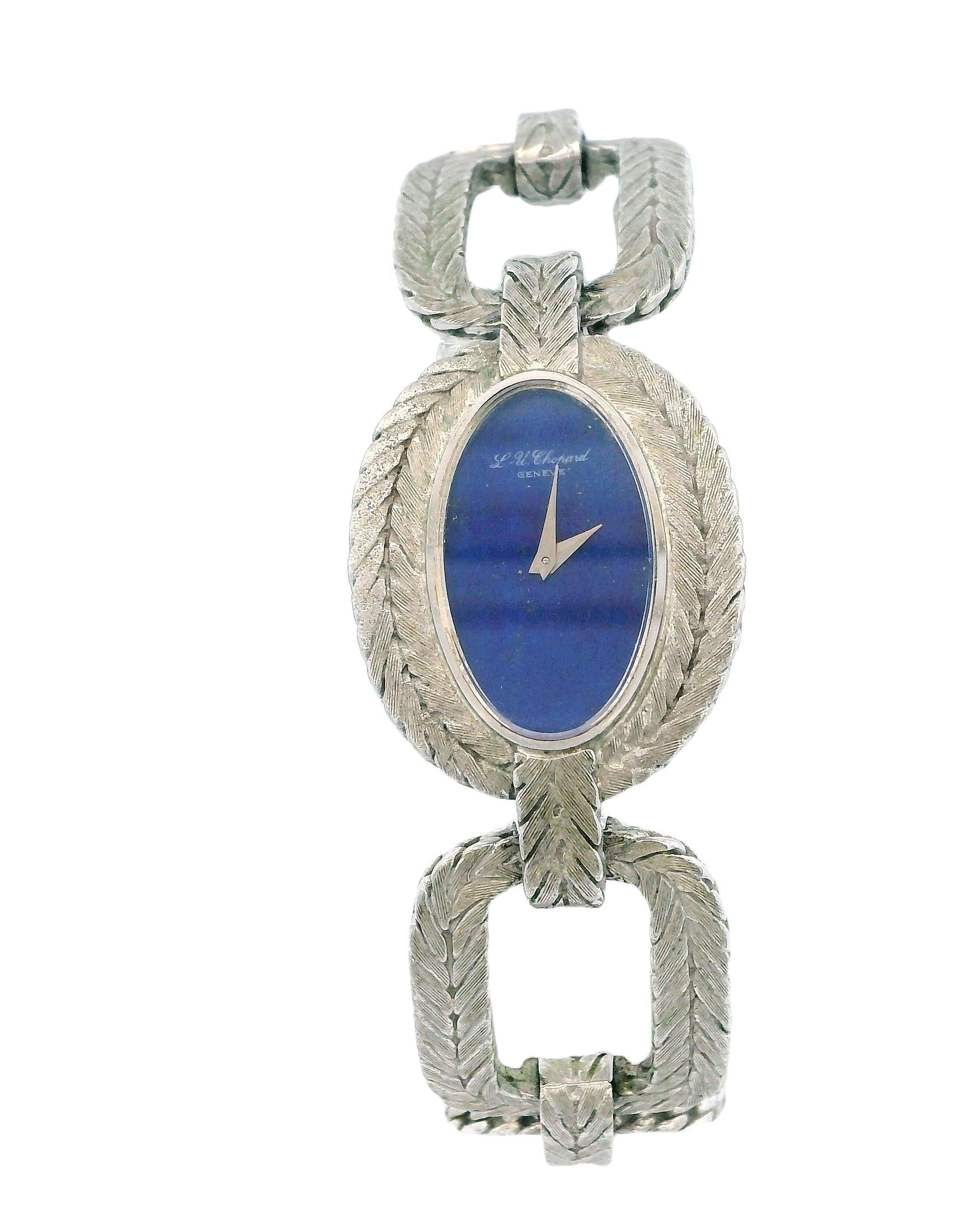 chopard oval lapis dial cush shp herringbone link brac 18kw