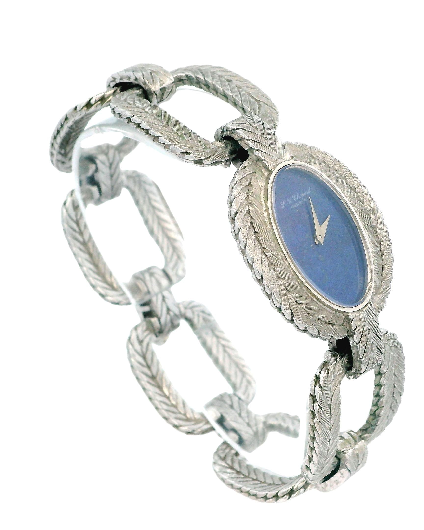 chopard oval lapis dial cush shp herringbone link brac 18kw