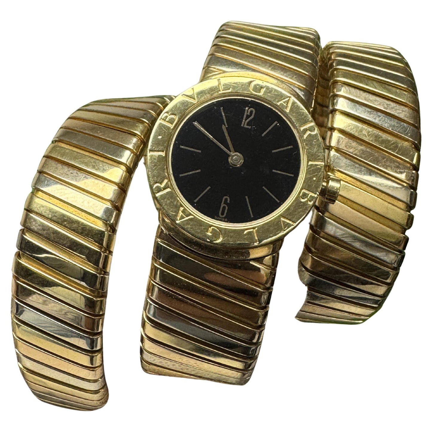 Bvlgari Vintage Tubogas Tricolor, in center watch, Double Wrap Tapered