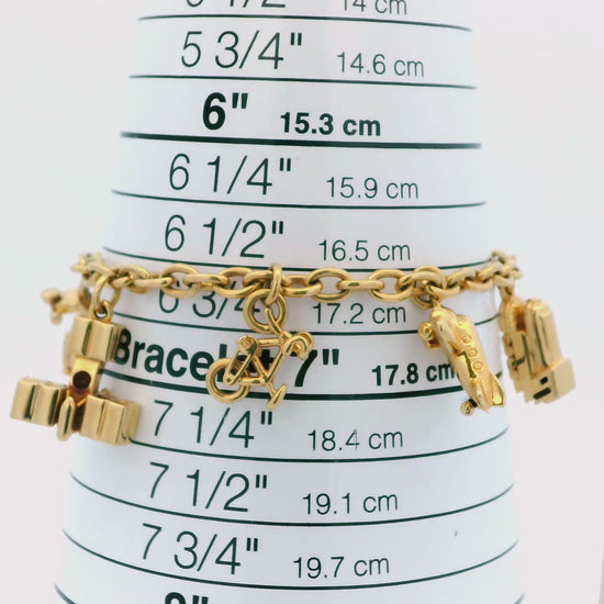 Cartier Estate 18K Yellow Gold 7 Charm Merry-Go-Round Bracelet