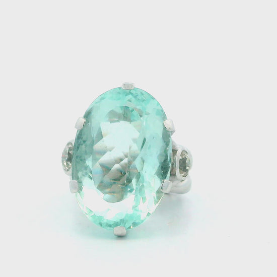 Ring 18kw lg oval 36ct aqua braided shank 2 side dias 1ct tw