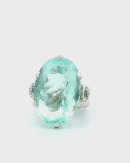 Ring 18kw lg oval 36ct aqua braided shank 2 side dias 1ct tw