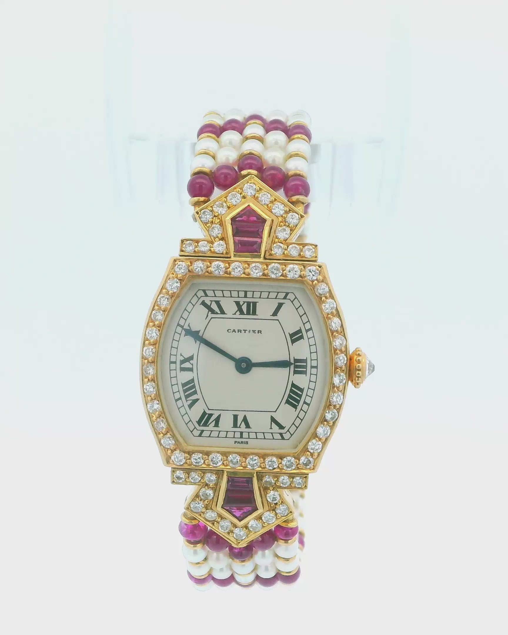 Cartier Tonneau A Rare Lady's Yellow Gold, Ruby, Diamond and Pearl-Set Bracelet